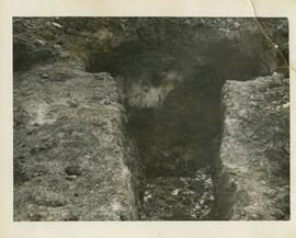 Hole being dug to hold an anchor for a tower antenna.