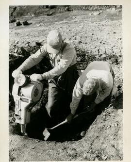 Hole being dug to hold an anchor for a tower antenna.