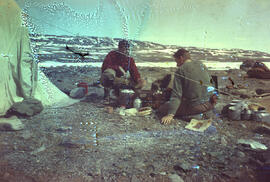 Vic Sim and Richard Moskal preparing meal.